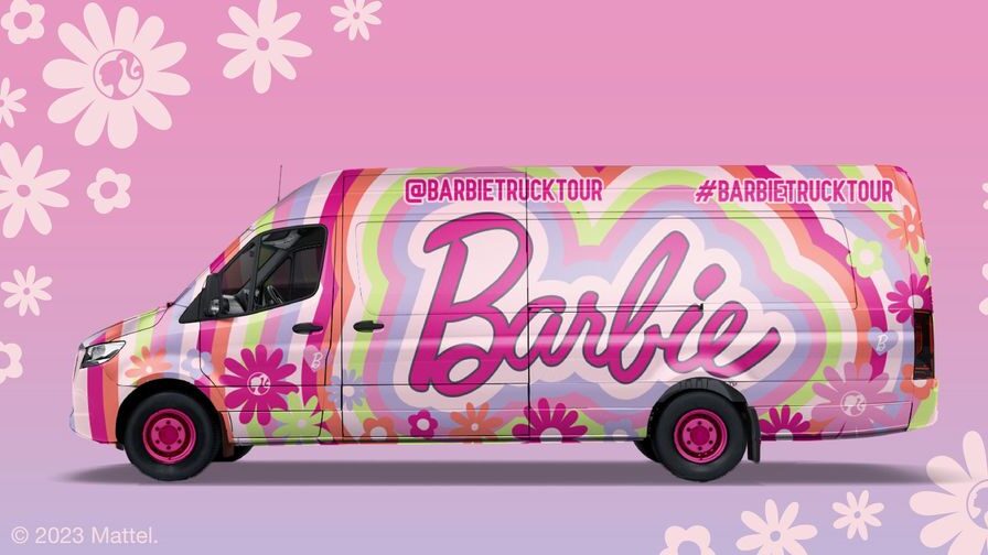 pink blue and green barbie van with white flowers