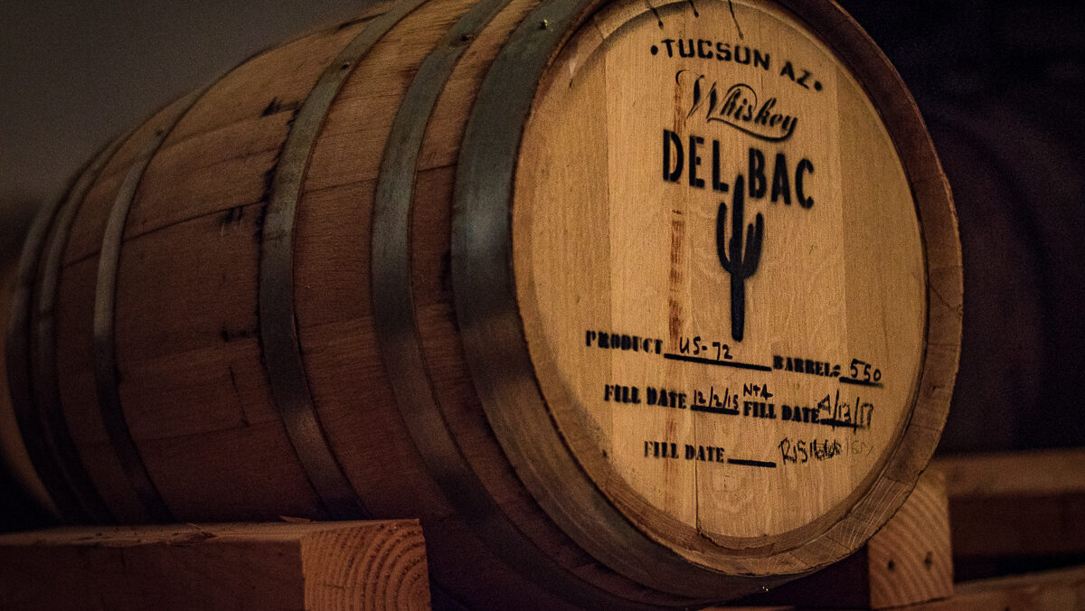 whiskey barrel with Del Bac logo