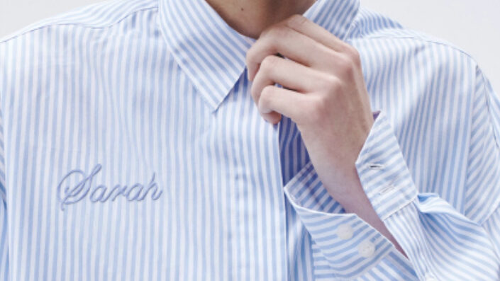 Close up view of an embroidered poplin shirt