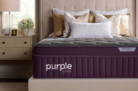A bed with a purple mattress