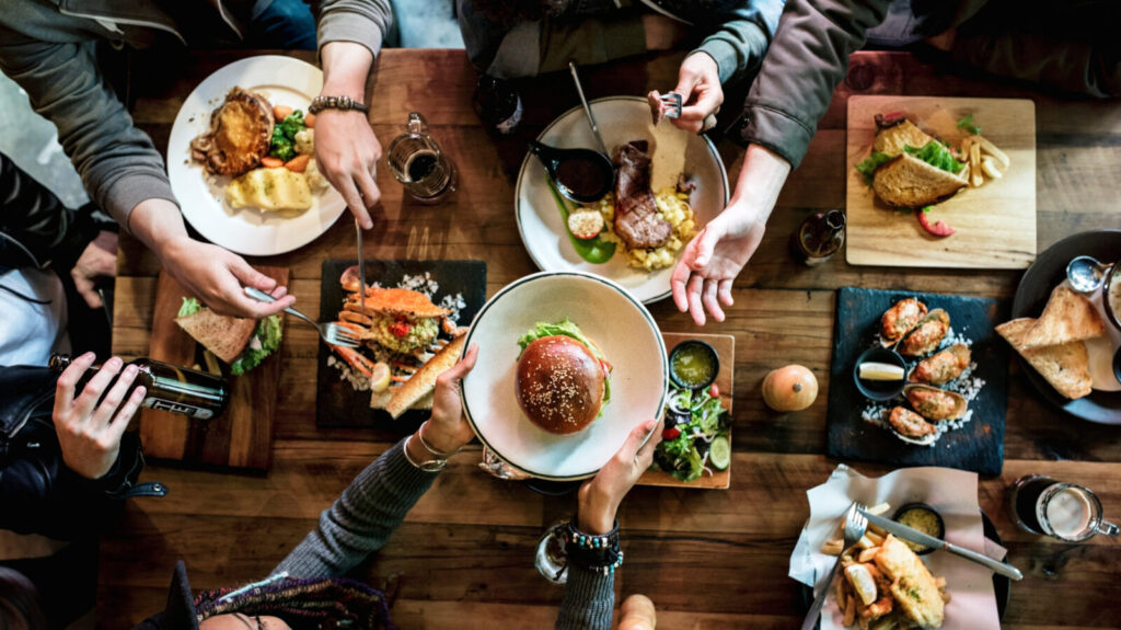 Group of people eating together