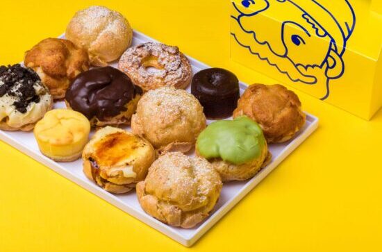A tray of colorful cream puffs from Beard Papa's