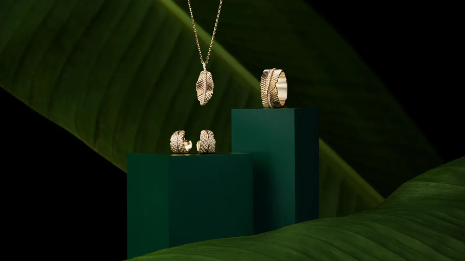 Gold jewelry on a green background