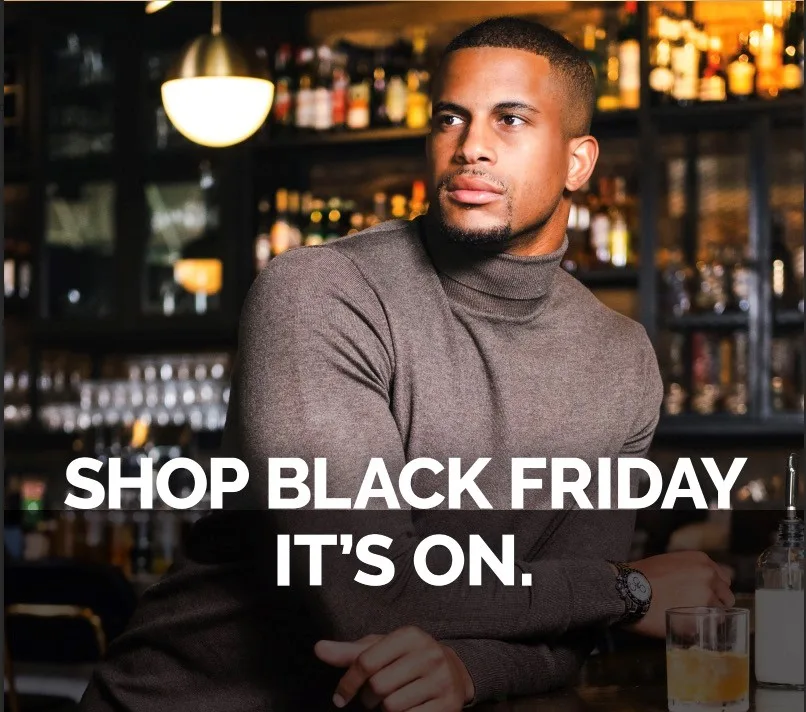 A man in a bar with text: Shop Black Friday. It's on.