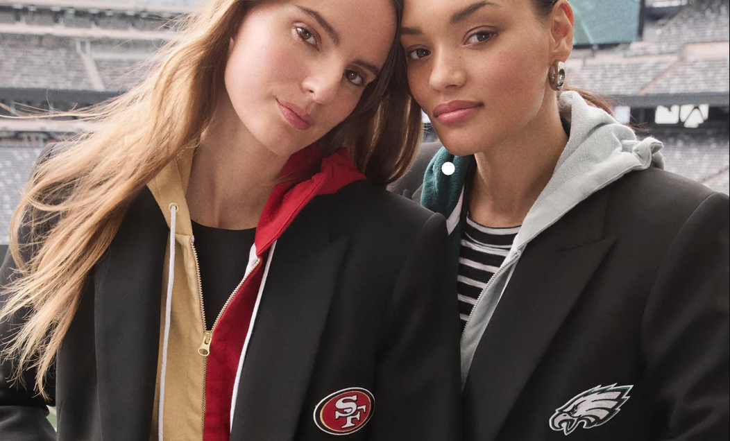 Two women in NFL blazers