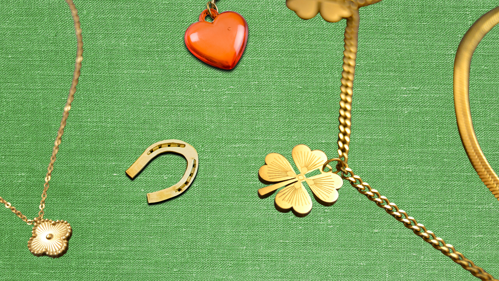 charms and chains on a green background