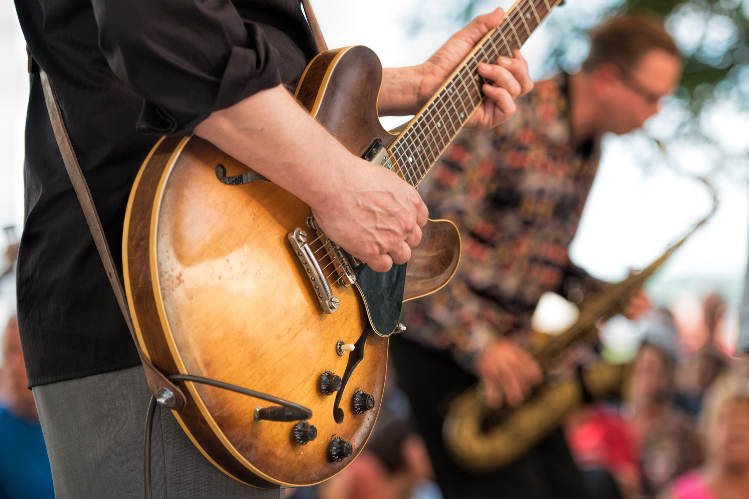 outdoor concert Close up photo of a band playing