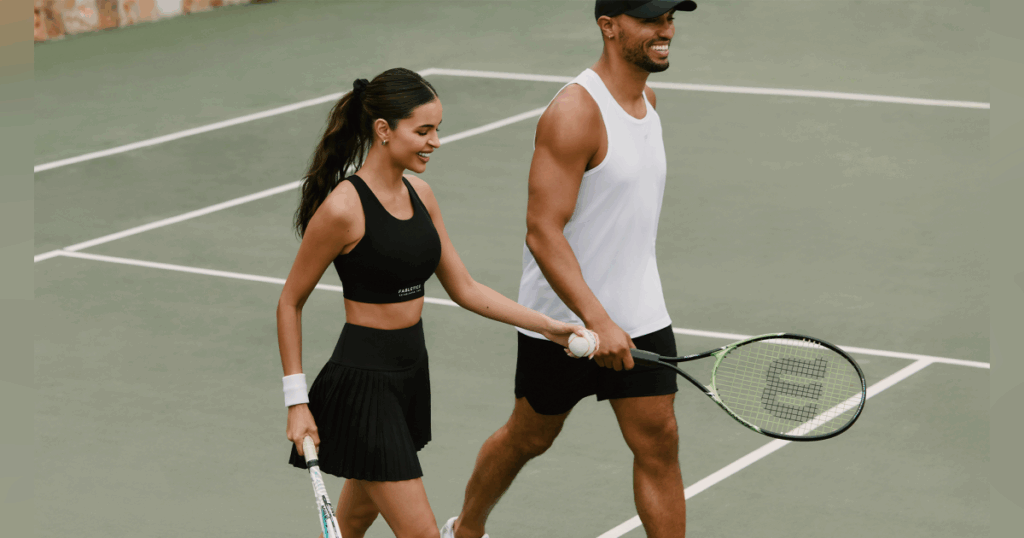a couple on a tennis court