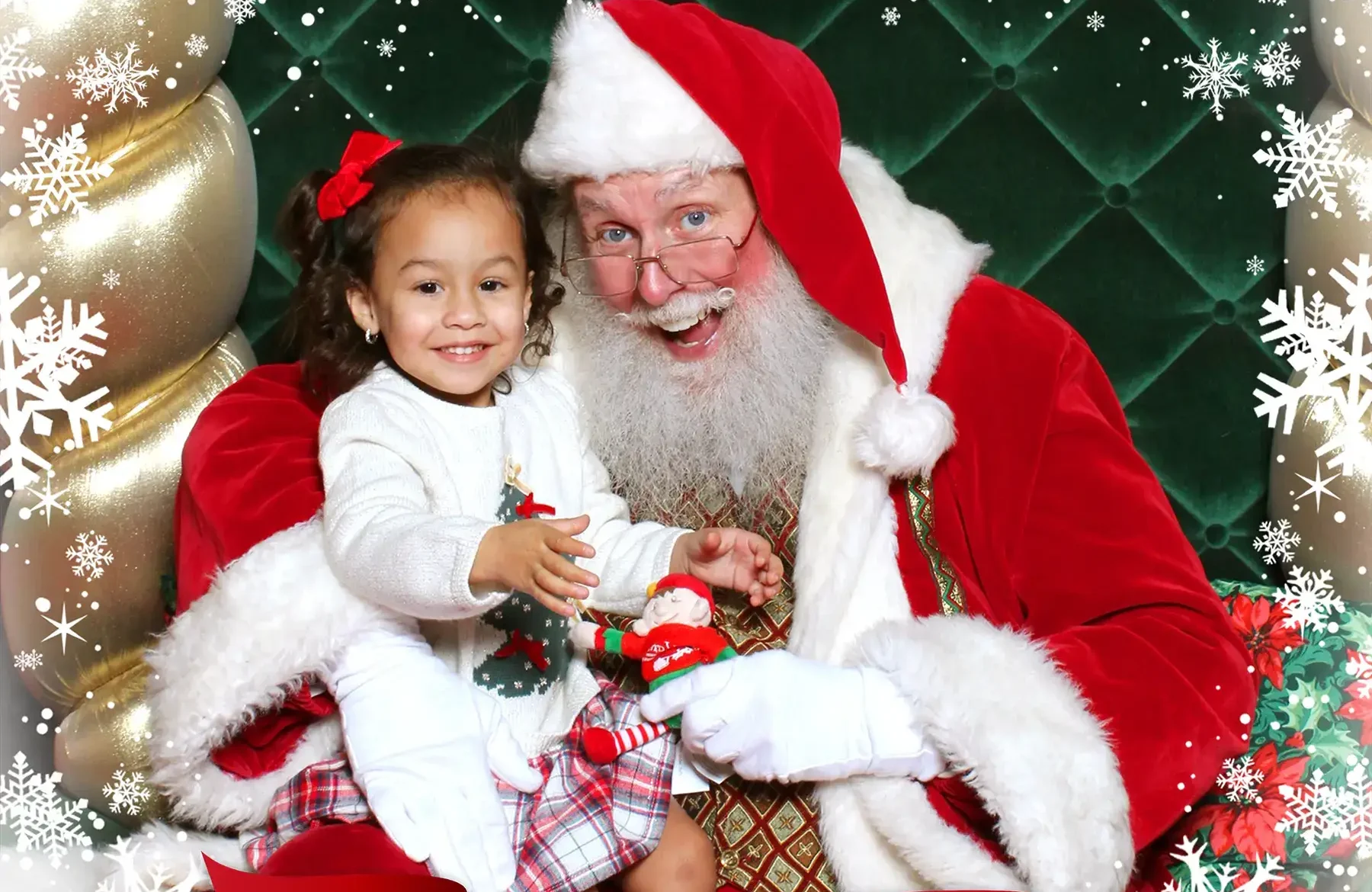 Santa posing with a child