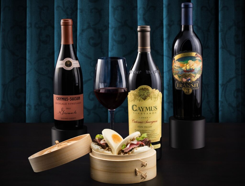 Bottles of wine and steak bao buns