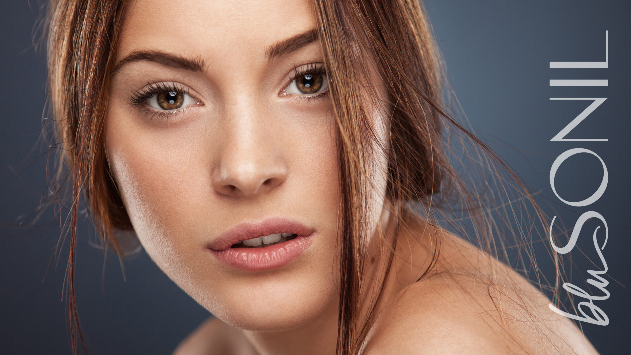 Woman's face + blusonil logo